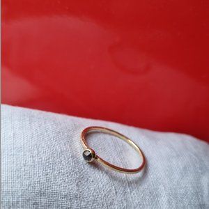 Gold stacking ring with black diamond, size 7, by Alexis Russell